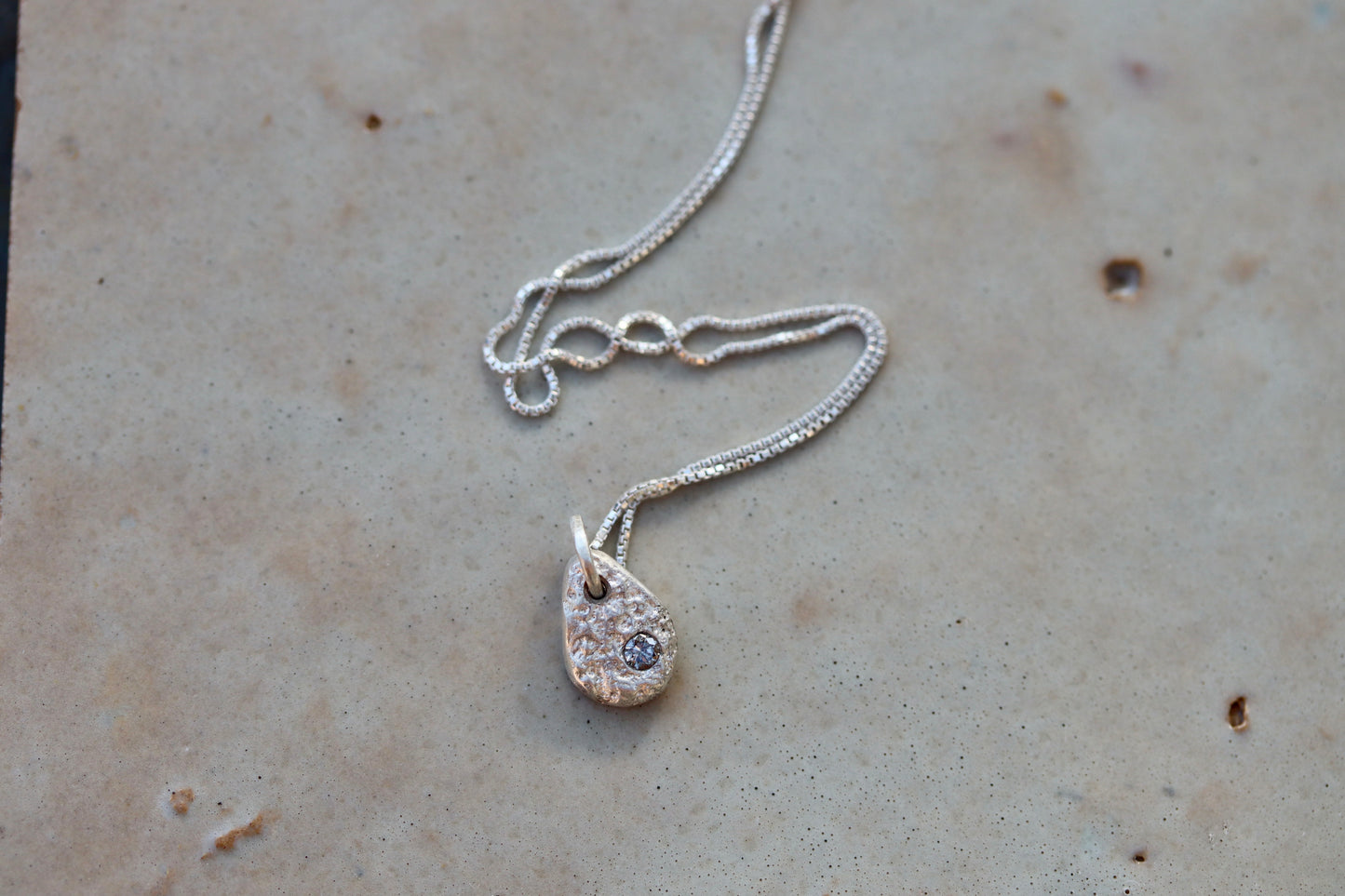 organic texture reclaimed diamond ethical rustic organic sandcast petite small ethical recycled silver necklace paige devlin jewelry