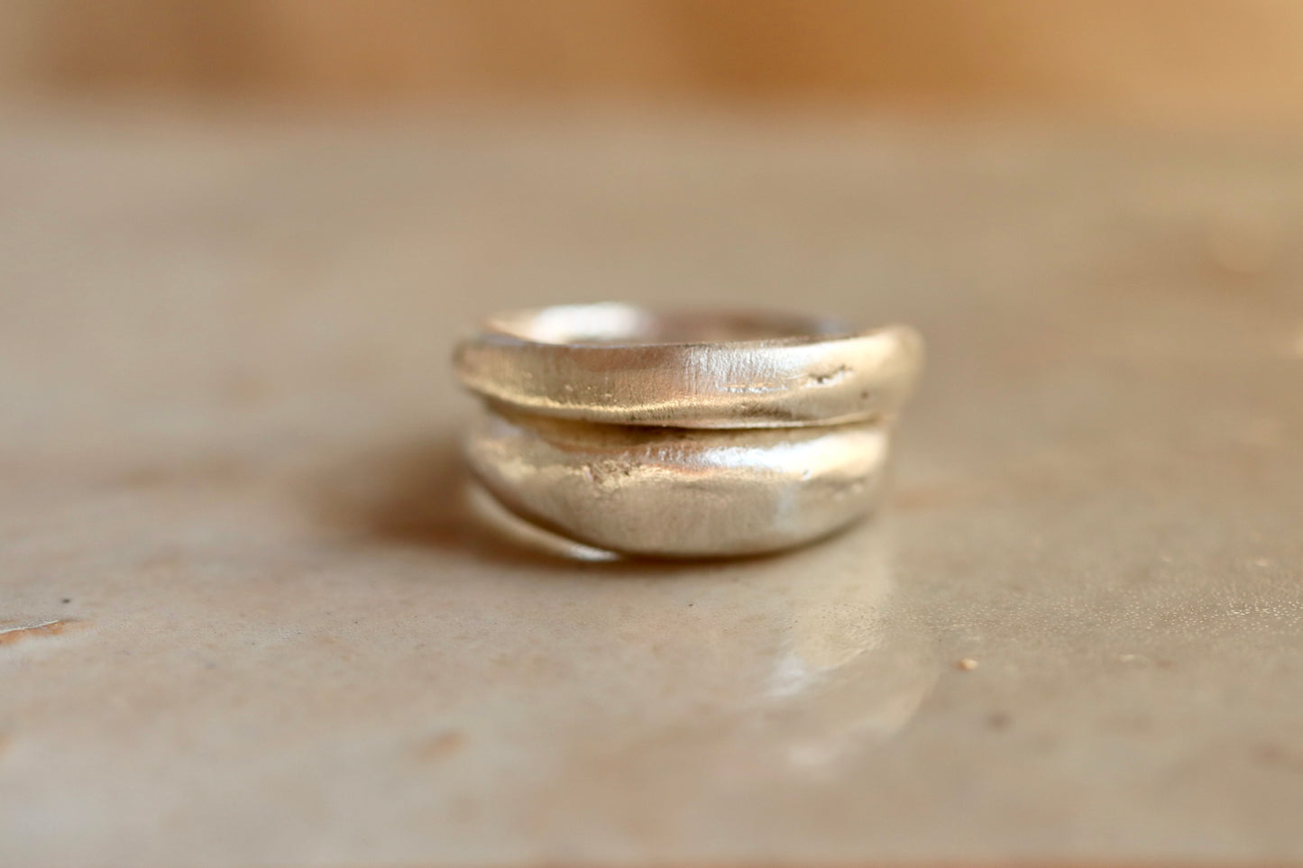 earthen sterling silver sandcast wedding band high dome wabi sabi organic textured stacking rings ethical earthy recycled silver paige devlin jewelry
