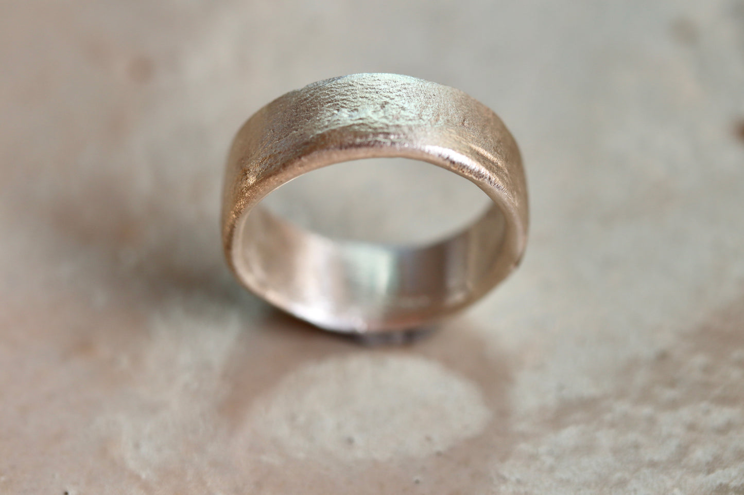 sandcast wide sterling silver wedding band mens rustic textured wide band ring paige devlin jewelry organic wabi sabi