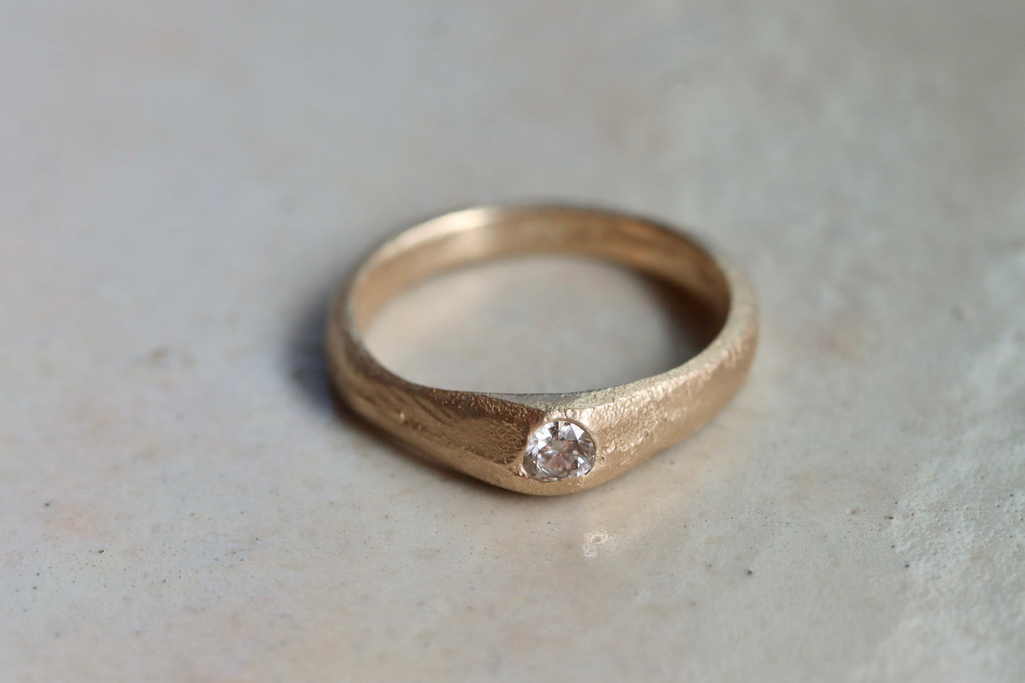 ethical diamond engagement solitaire ring reclaimed diamond sandcast recycled diamond recycled gold sustainable diamond ring earthy diamond ring organic texture diamond ring paige devlin jewelry