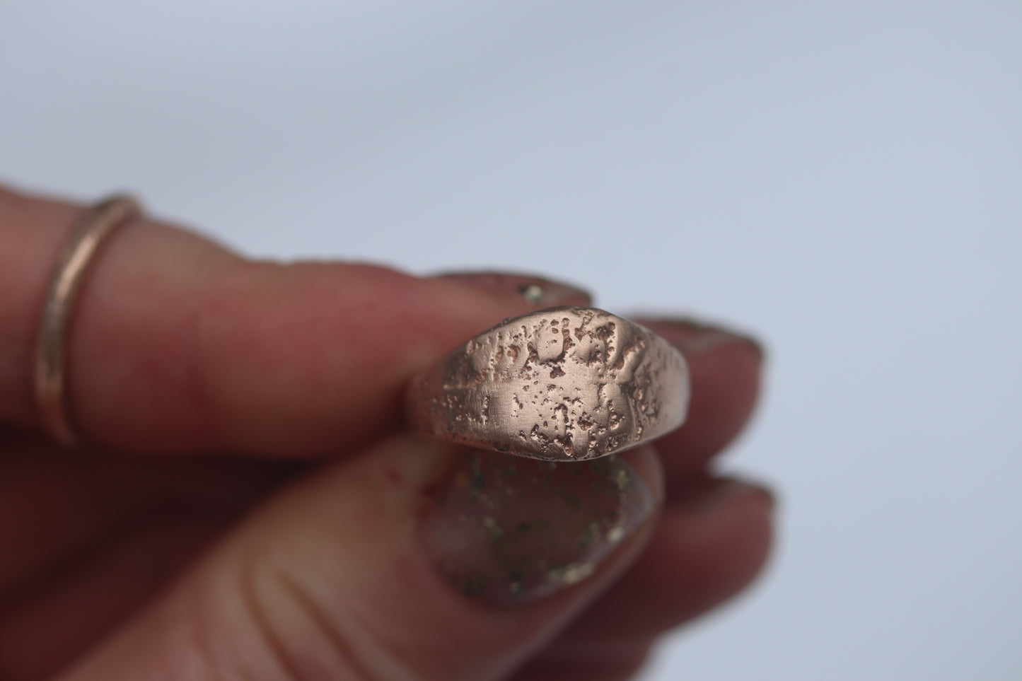 textured recycled gold recycled silver sheild ring handmade wide tapering saddle organic ring sandcast paige devlin jewelry ethical alternative wedding band wide band