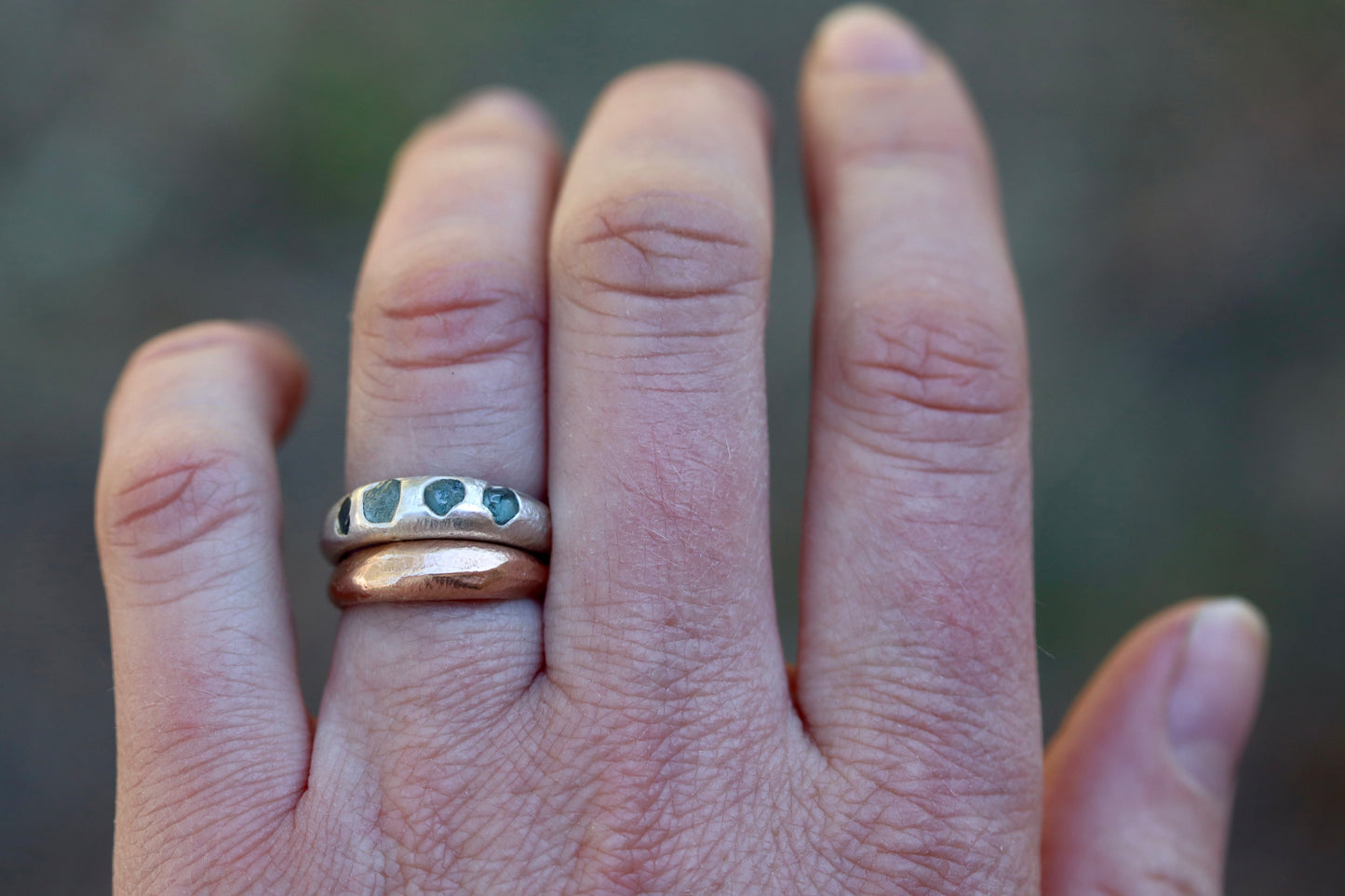 raw montana sapphire sandcast rough rustic earthy cast in place wedding thick silver band paige devlin jewelry ethical organic texture