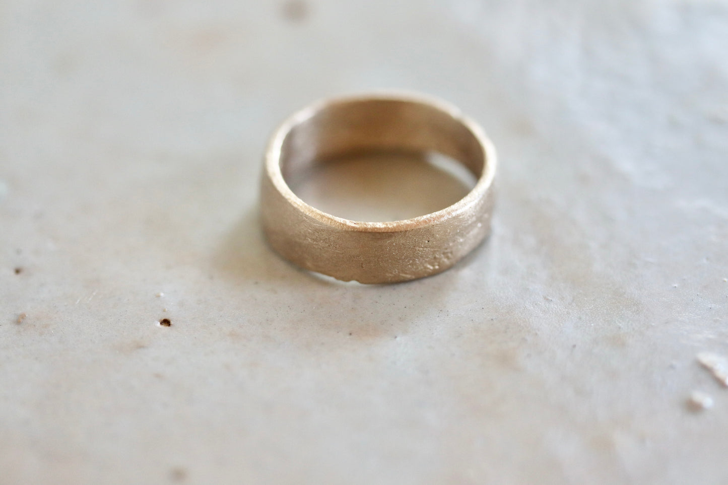 sandcast wide organic wedding band recycled 14kt gold paige devlin jewelry rustic mens band organic texture thick earthen earthy