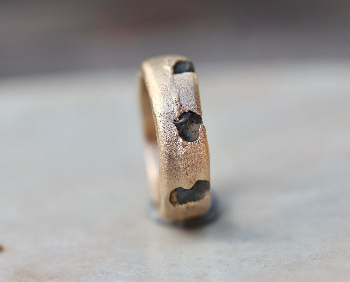 organic texture raw montana sapphire recycled gold sandcast ethical earthen paige devlin jewelry rustic rough mens wedding band