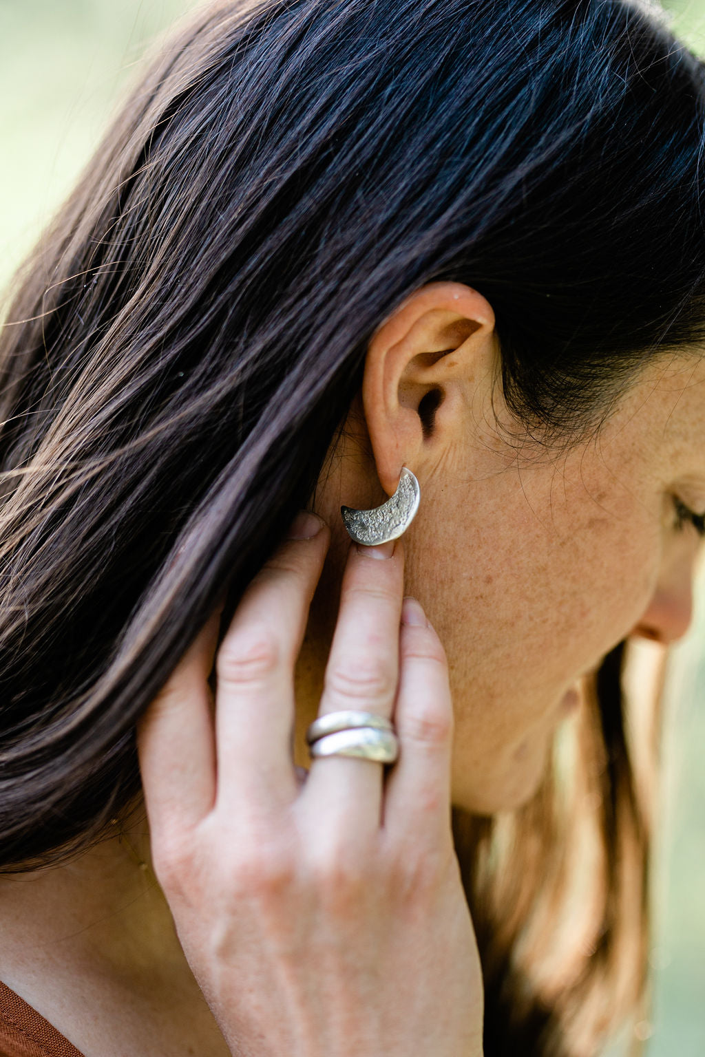 organic textured sterling silver crescent moon hoops witchy jewelry paige devlin jewelry artist