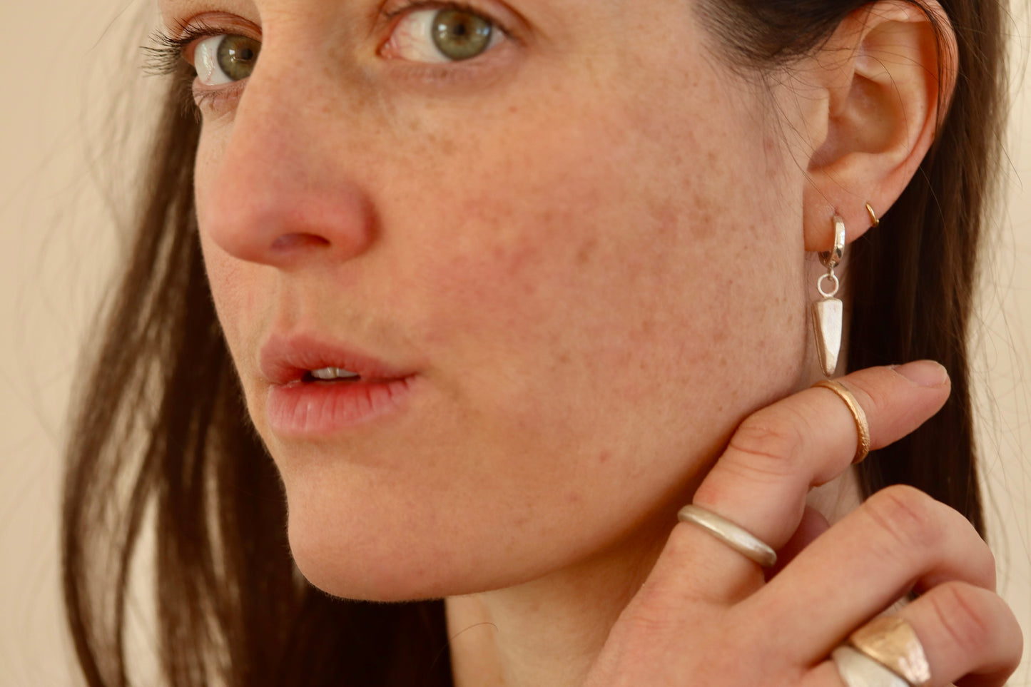 sandcast organic hoops silver handmade rose thorn earrings spear earrings dagger huggie hoops