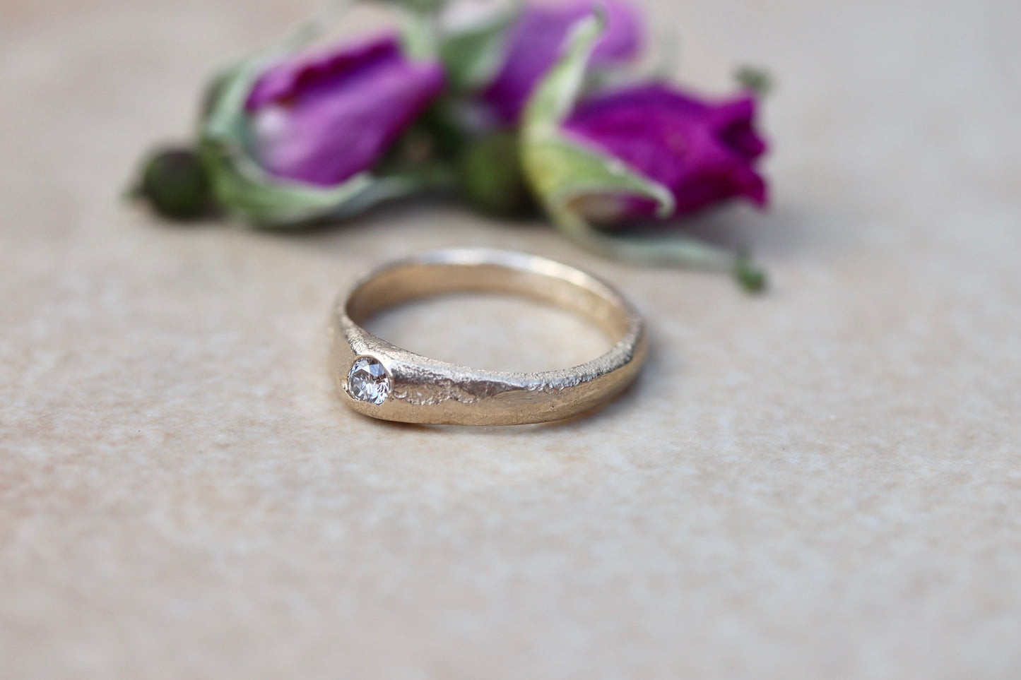 ethical diamond engagement solitaire ring reclaimed diamond sandcast recycled diamond recycled gold sustainable diamond ring earthy diamond ring organic texture diamond ring paige devlin jewelry low profile gold diamond organic rustic signet