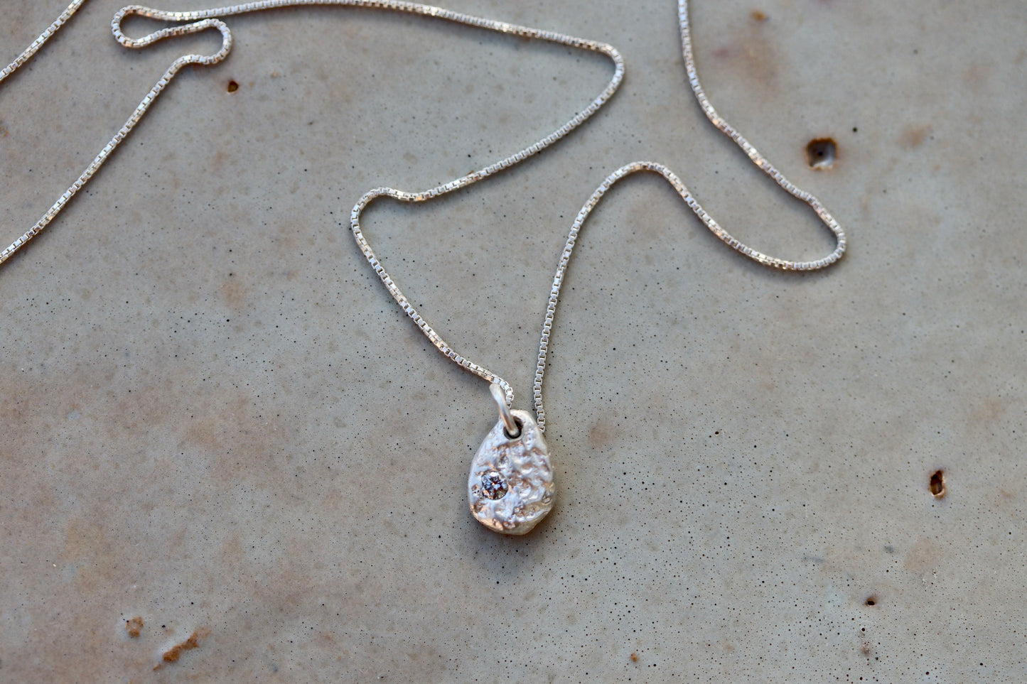 ethical diamond organic texture sandcast small petite necklace paige devlin jewelry minimal organic pendant