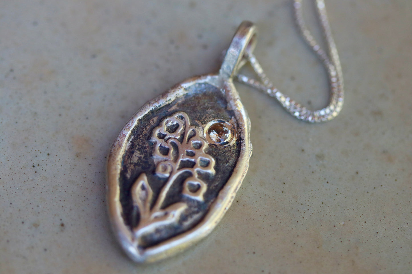 heather mountain pendant sterling silver handmade handcrafted montana sapphire pink floral alpine wildflower necklace paige devlin jewelry