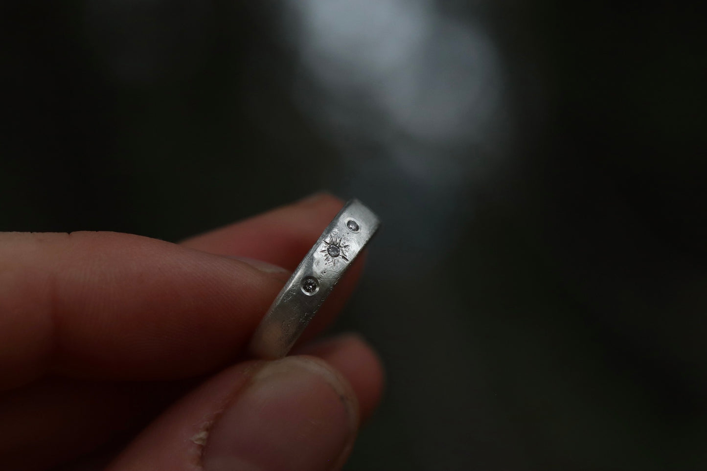 rustic organic sandcast wedding band 14kt recycled white gold diamond paige devlin jewelry