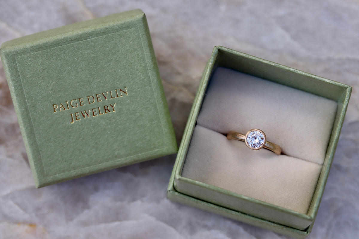 solitaire 1ct ethical diamond earthy organic texture sandcast wedding engagement ring paige devlin methow valley washington wedding jeweler alternative unique nature inspired ring 14kt recycled gold artisan handcrafted