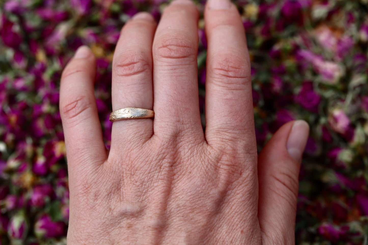 thin 14kt recycled gold organic minimal texture sandcast wedding band ethical paige devlin jewelry