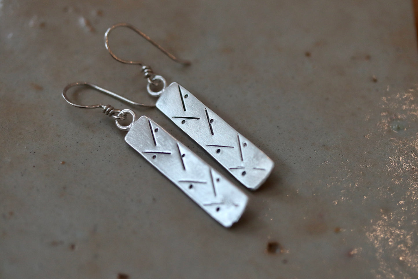 Skadi Earrings. Skate