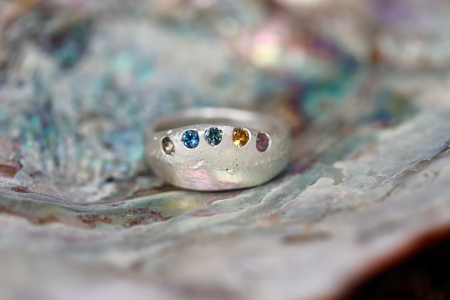 rainbow montana sapphire sterling silver handmade ring colorful organic chunky sandcast ring the arrowleaf