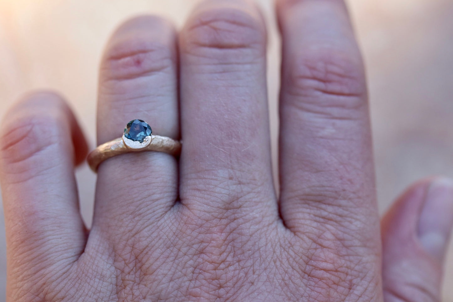 rustic sandcast organic montana sapphire solitaire ring band the arrowleaf