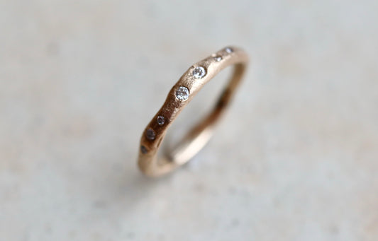 rustic organic sandcast ethical reclaimed scattered diamonds paige devlin jewelry wedding band ring wabi sabi rustic celestial