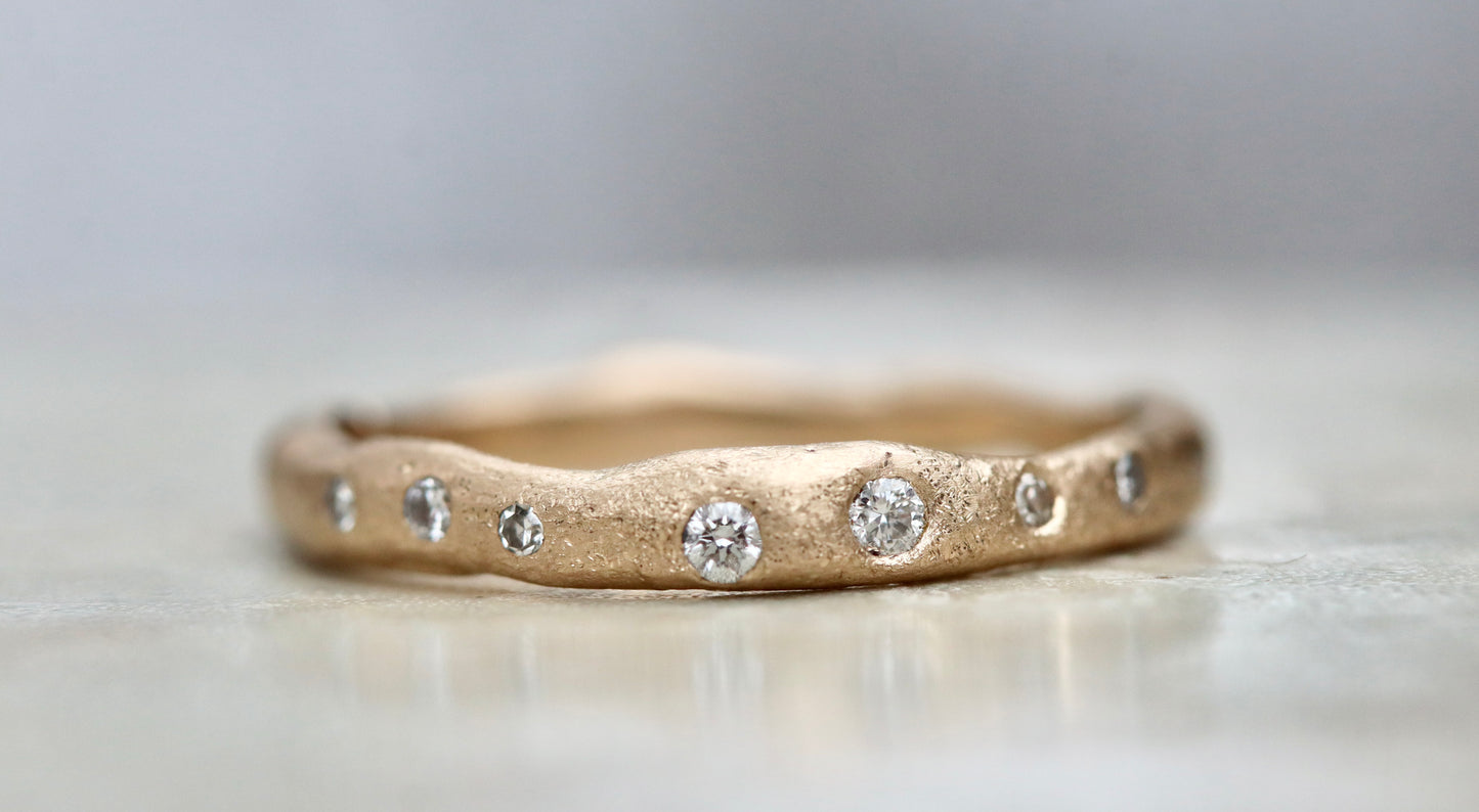 rustic organic gold 14kt sandcast ethical reclaimed scattered diamonds paige devlin jewelry wedding band ring wabi sabi rustic celestial