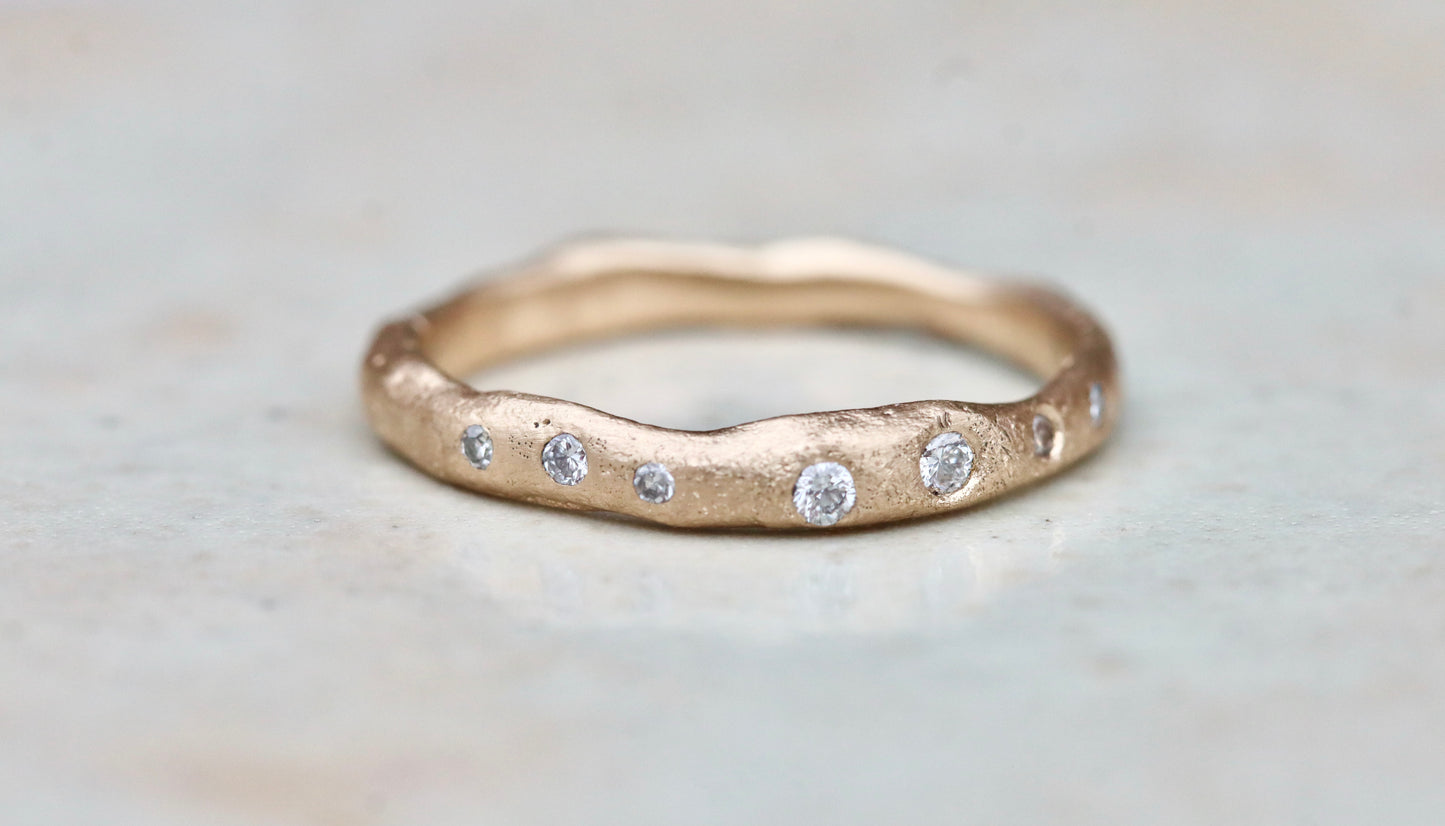 rustic organic gold 14kt sandcast ethical reclaimed scattered diamonds paige devlin jewelry wedding band ring wabi sabi rustic