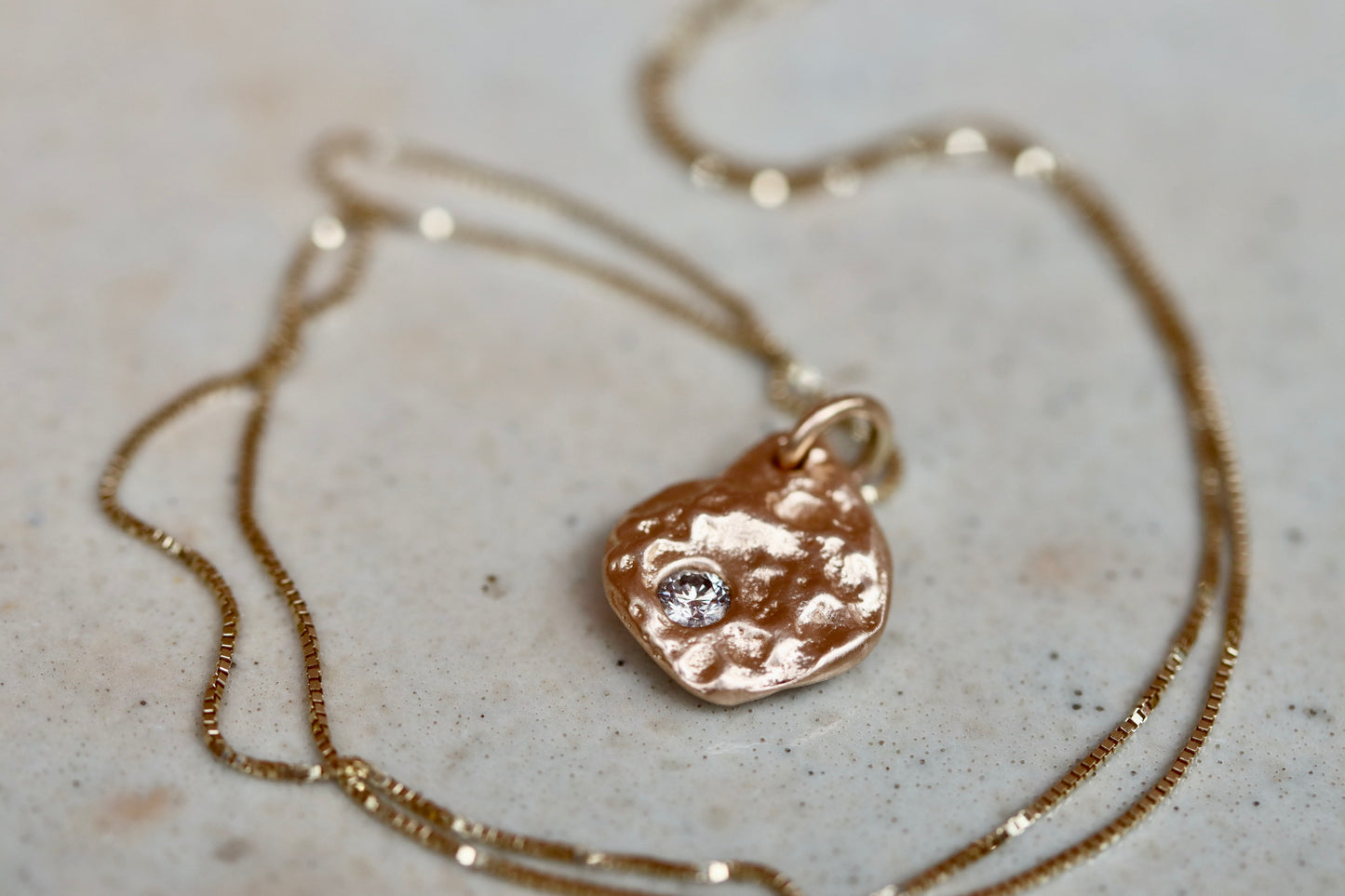 sandcast ethical reclaimed recycled diamond recycled 14kt gold textured handmade artisan made small pendant necklace 