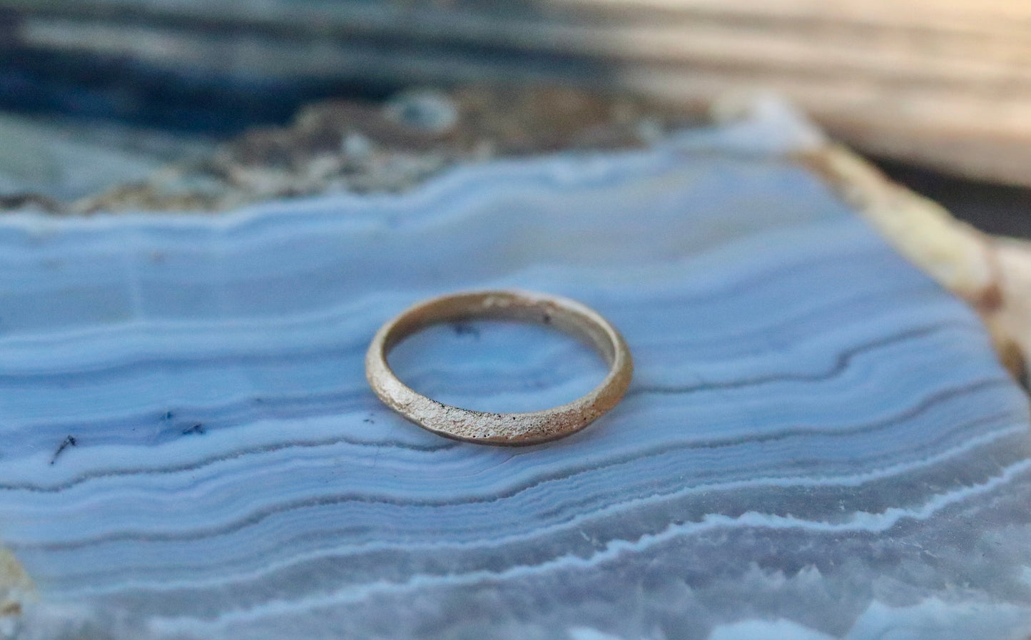 thin organic peaked wedding band 14kt recycled gold sandcast