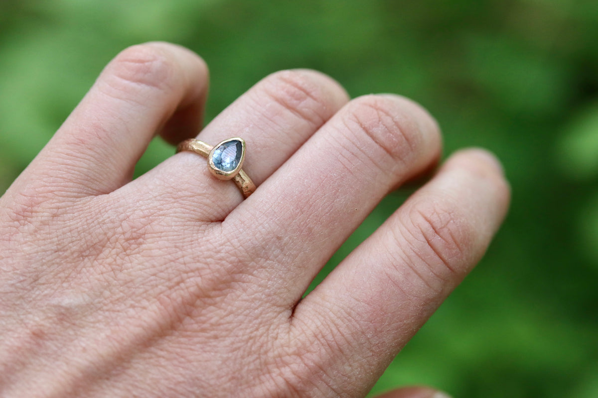 blue pear montana sapphire organic texture sandcast .5ct 1.ct engagement solitaire ring band ethical sustainable paige devlin jewelry earthy rustic  nature inspired lavender textured