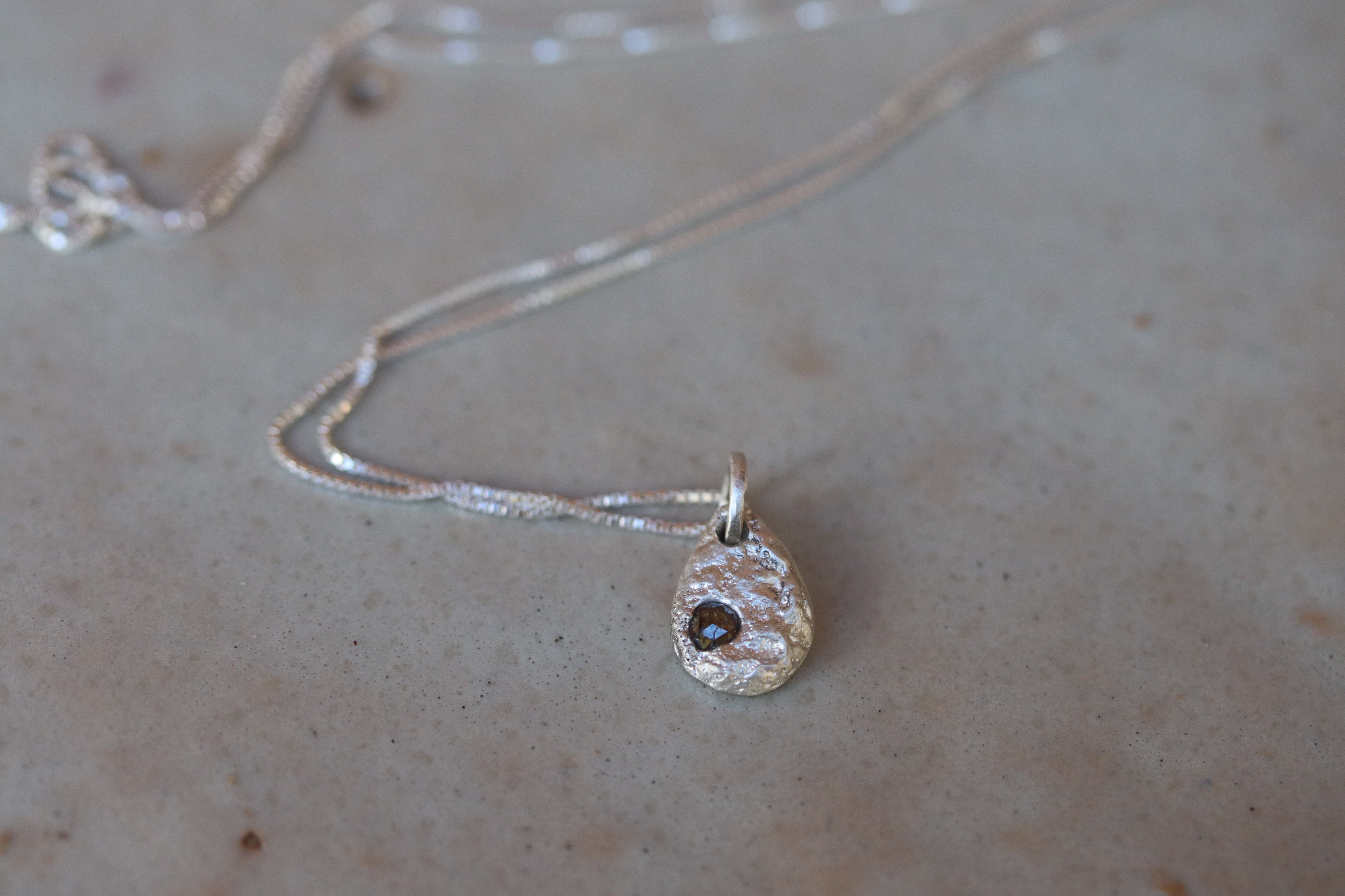 Devalyn long necklace in silver top