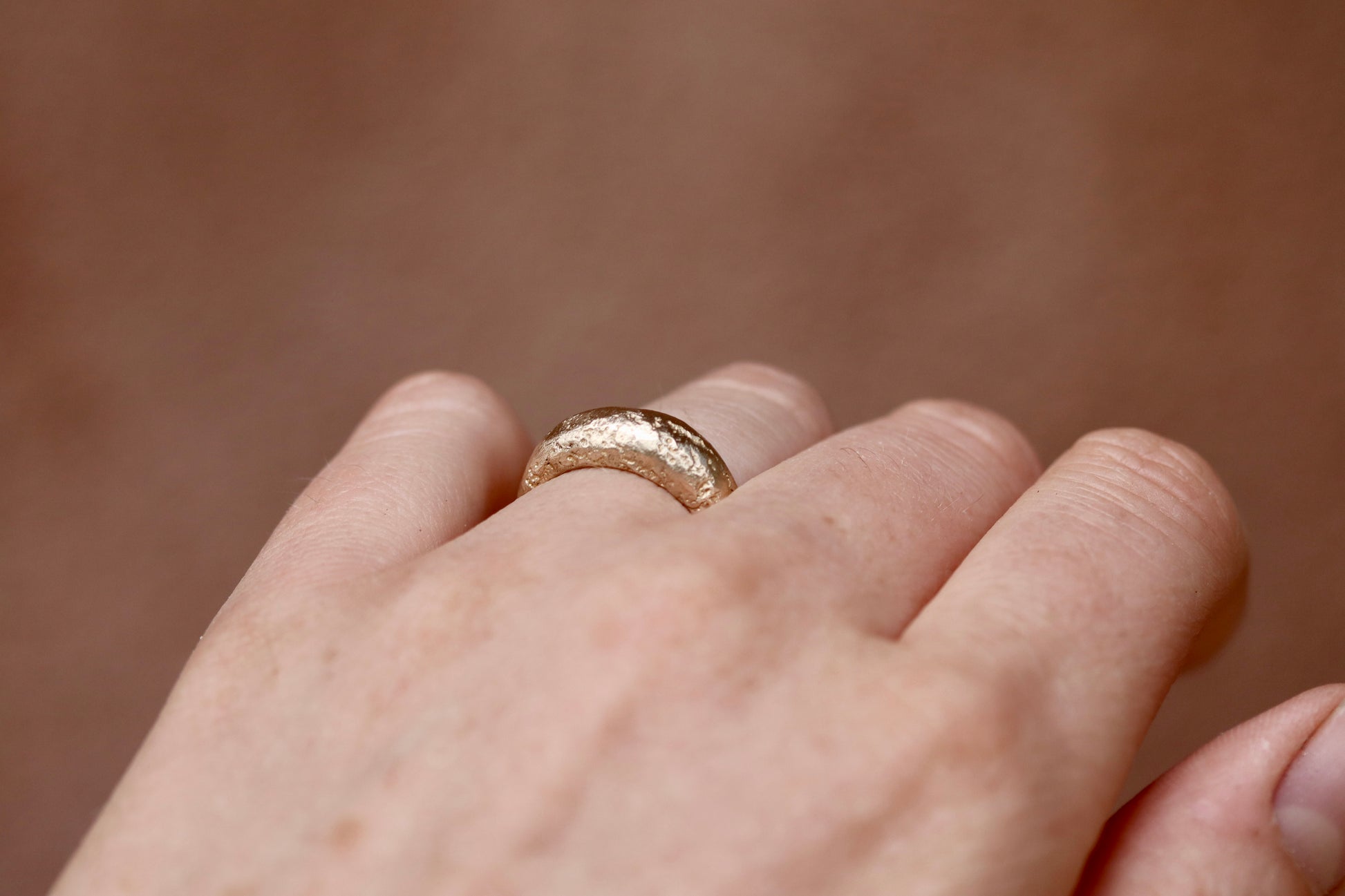 earthen rustic high dome recycled gold sandcast wedding band textured chunky handmade wedding band paige devlin jewelry
