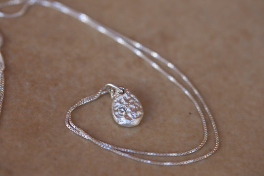 ethical diamond organic texture sandcast small petite necklace paige devlin jewelry minimal organic pendant