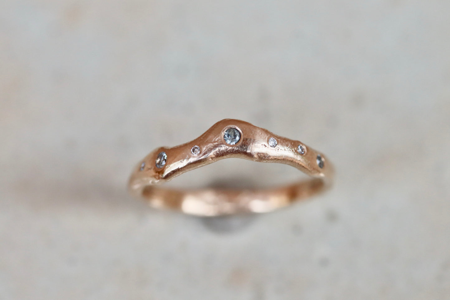 ethical montana sapphire diamond 14kt yellow recycled gold organic texture wavy scattered diamond wedding band nature inspired whimsical paige devlin jewelry