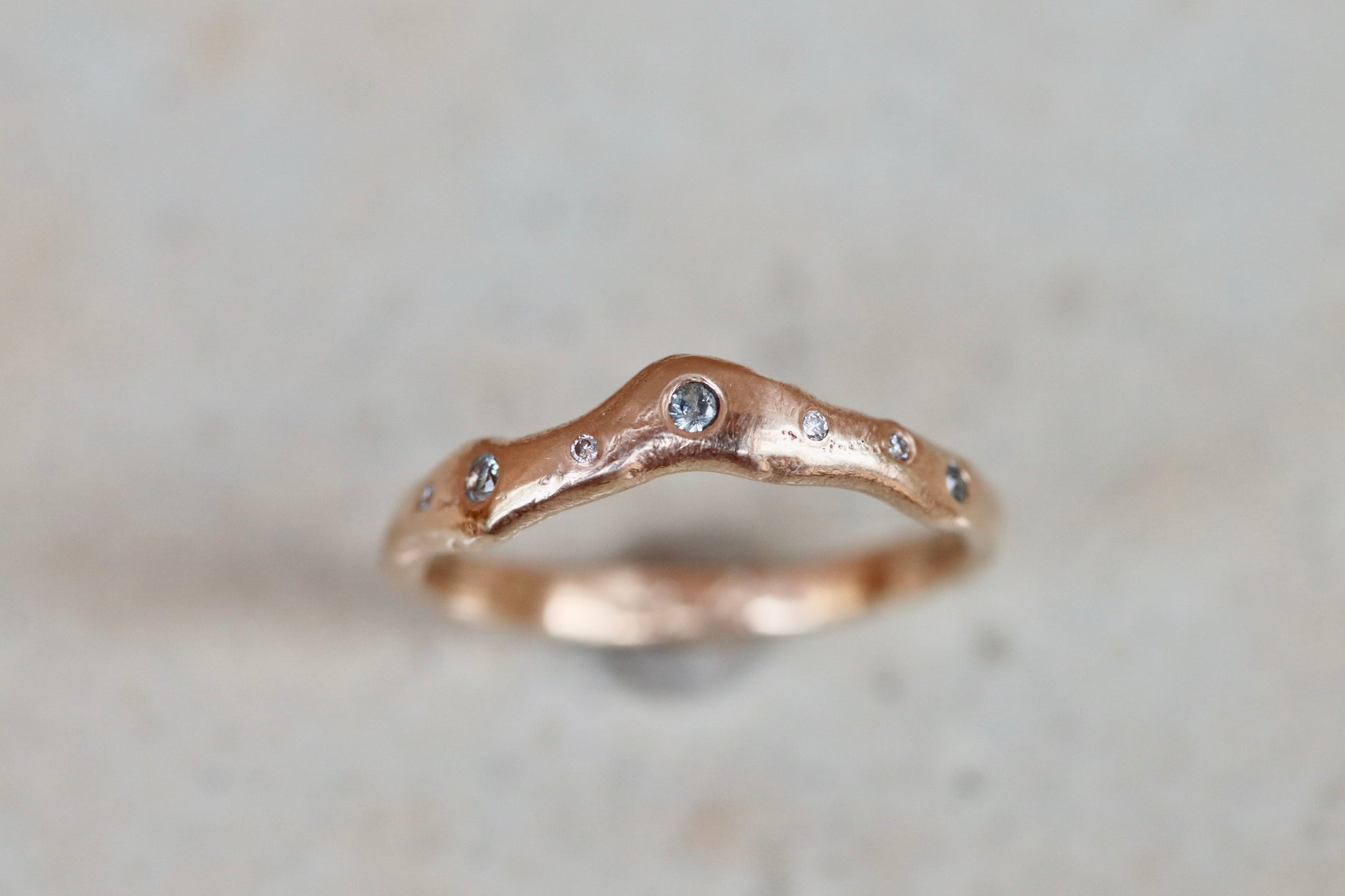 ethical montana sapphire diamond 14kt yellow recycled gold organic texture wavy scattered diamond wedding band nature inspired whimsical paige devlin jewelry