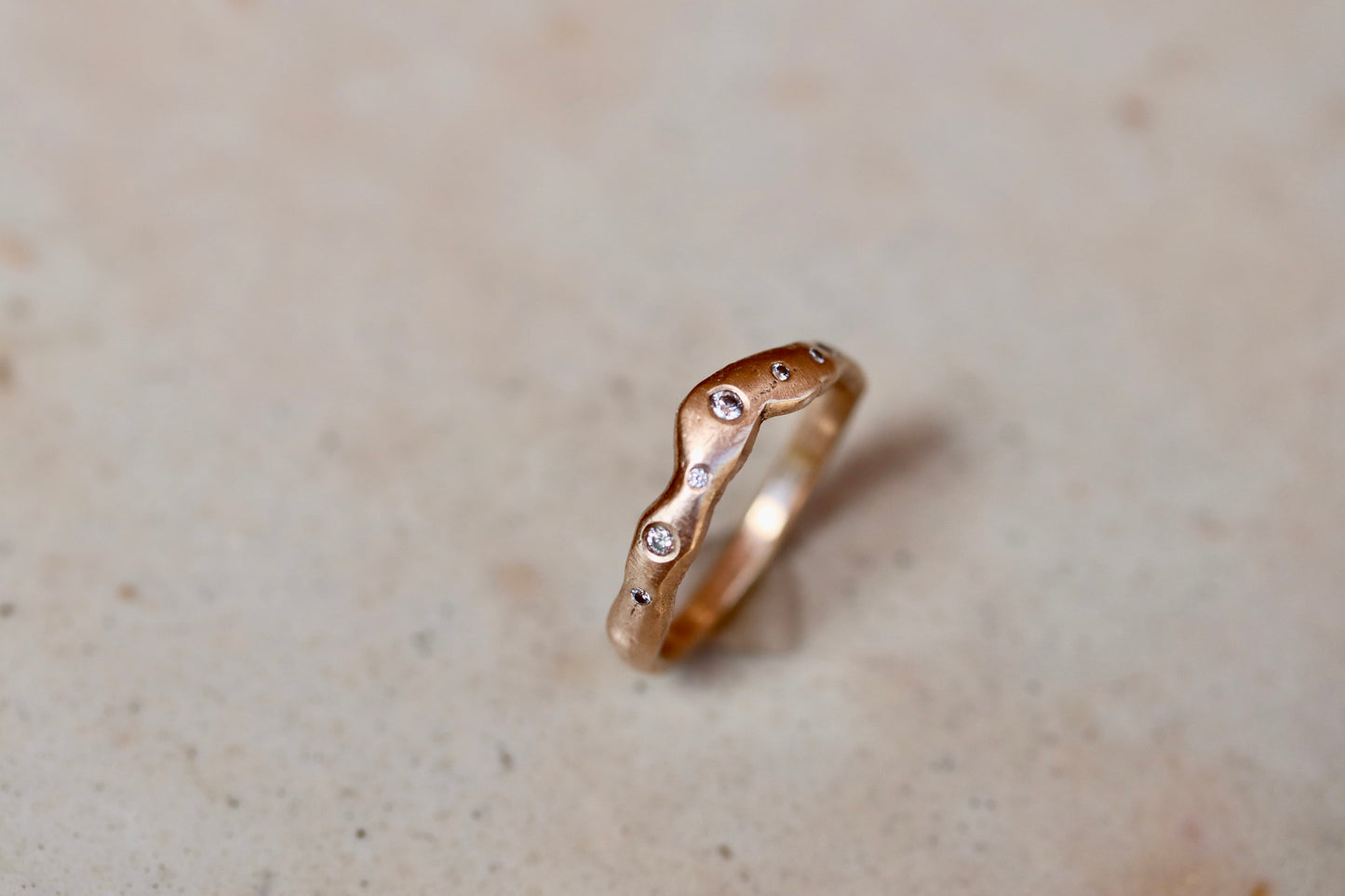 ethical montana sapphire diamond 14kt yellow recycled gold organic texture wavy scattered diamond wedding band nature inspired whimsical paige devlin jewelry
