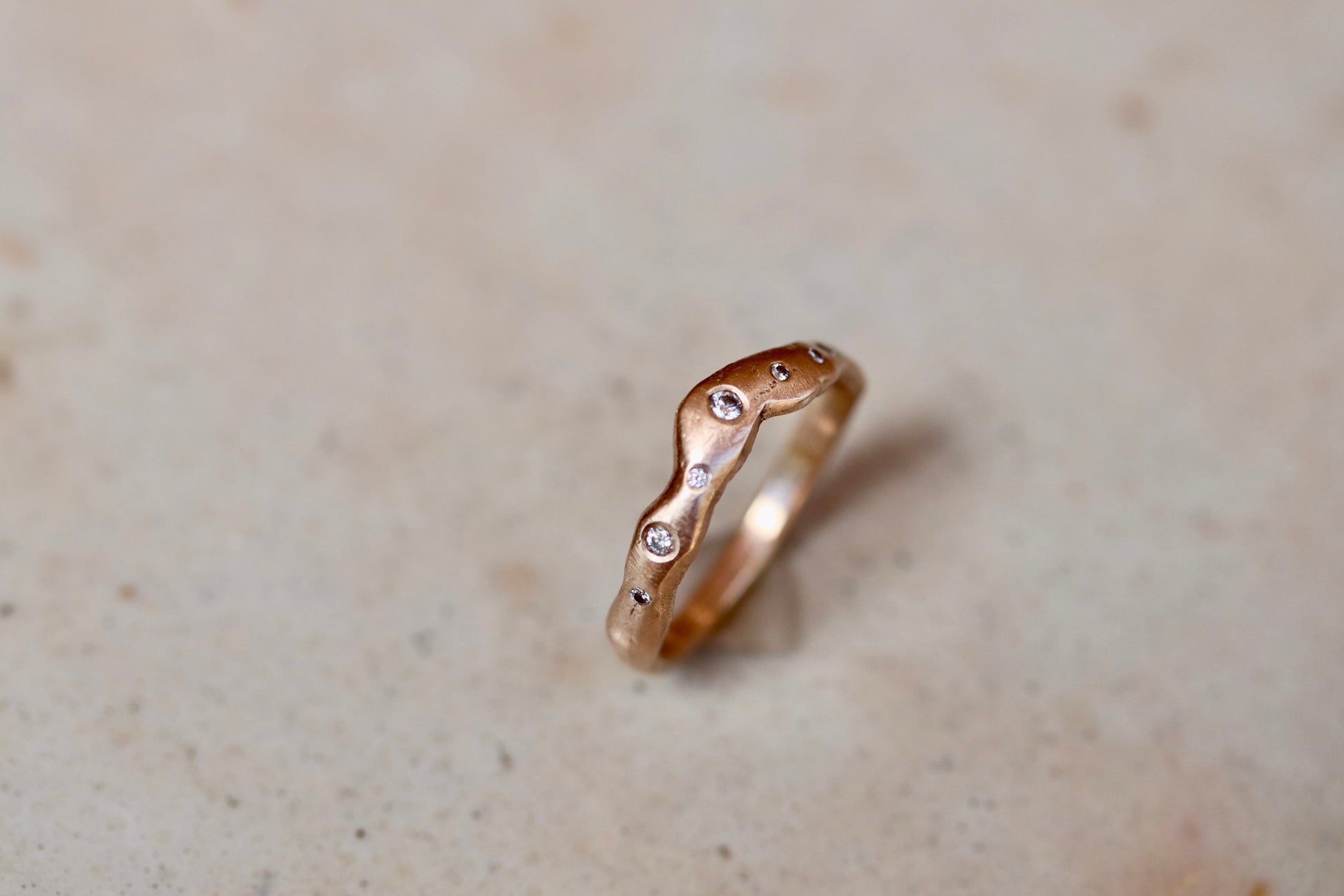 ethical montana sapphire diamond 14kt yellow recycled gold organic texture wavy scattered diamond wedding band nature inspired whimsical paige devlin jewelry