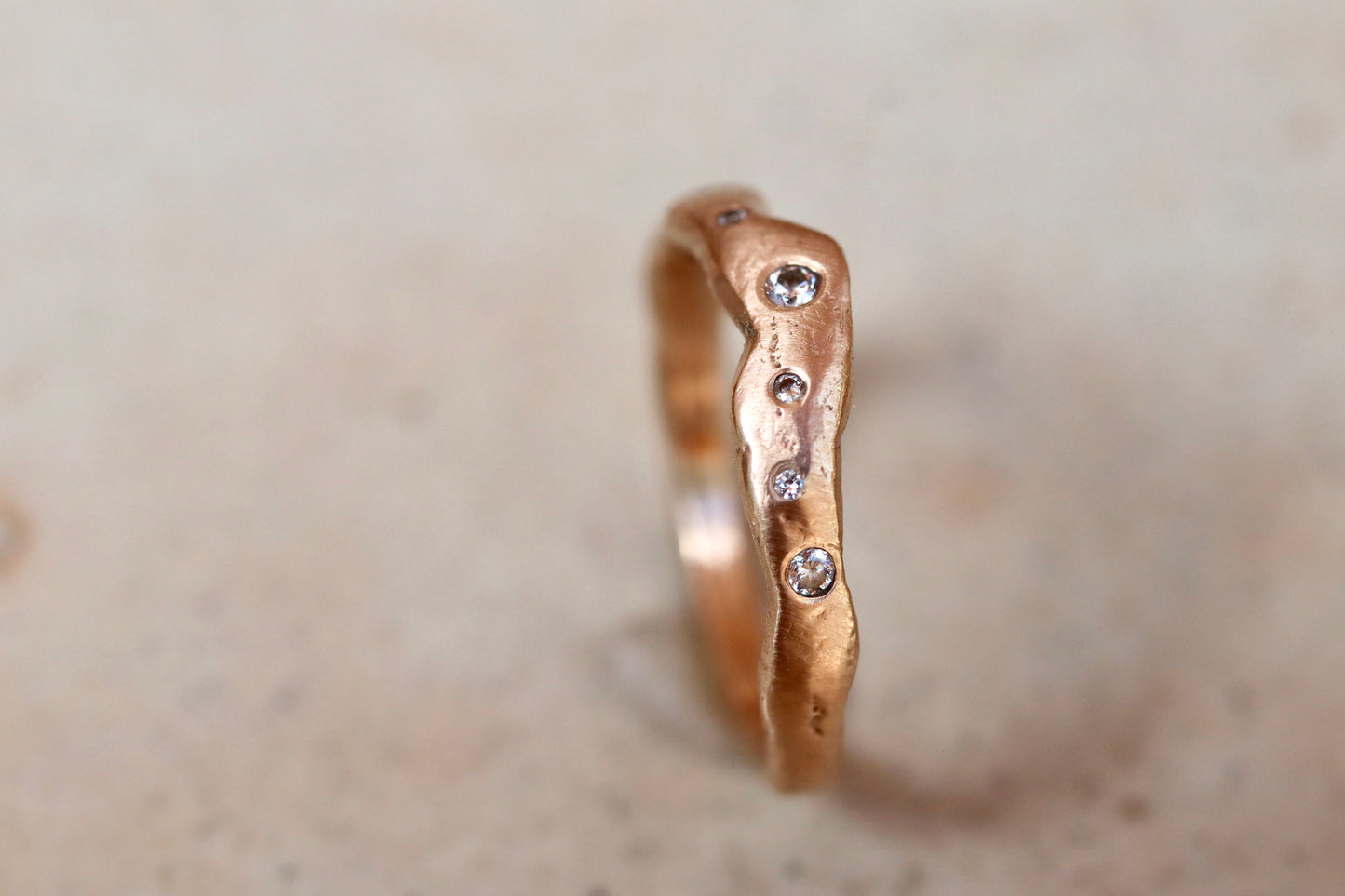 ethical montana sapphire diamond 14kt yellow recycled gold organic texture wavy scattered diamond wedding band nature inspired whimsical paige devlin jewelry