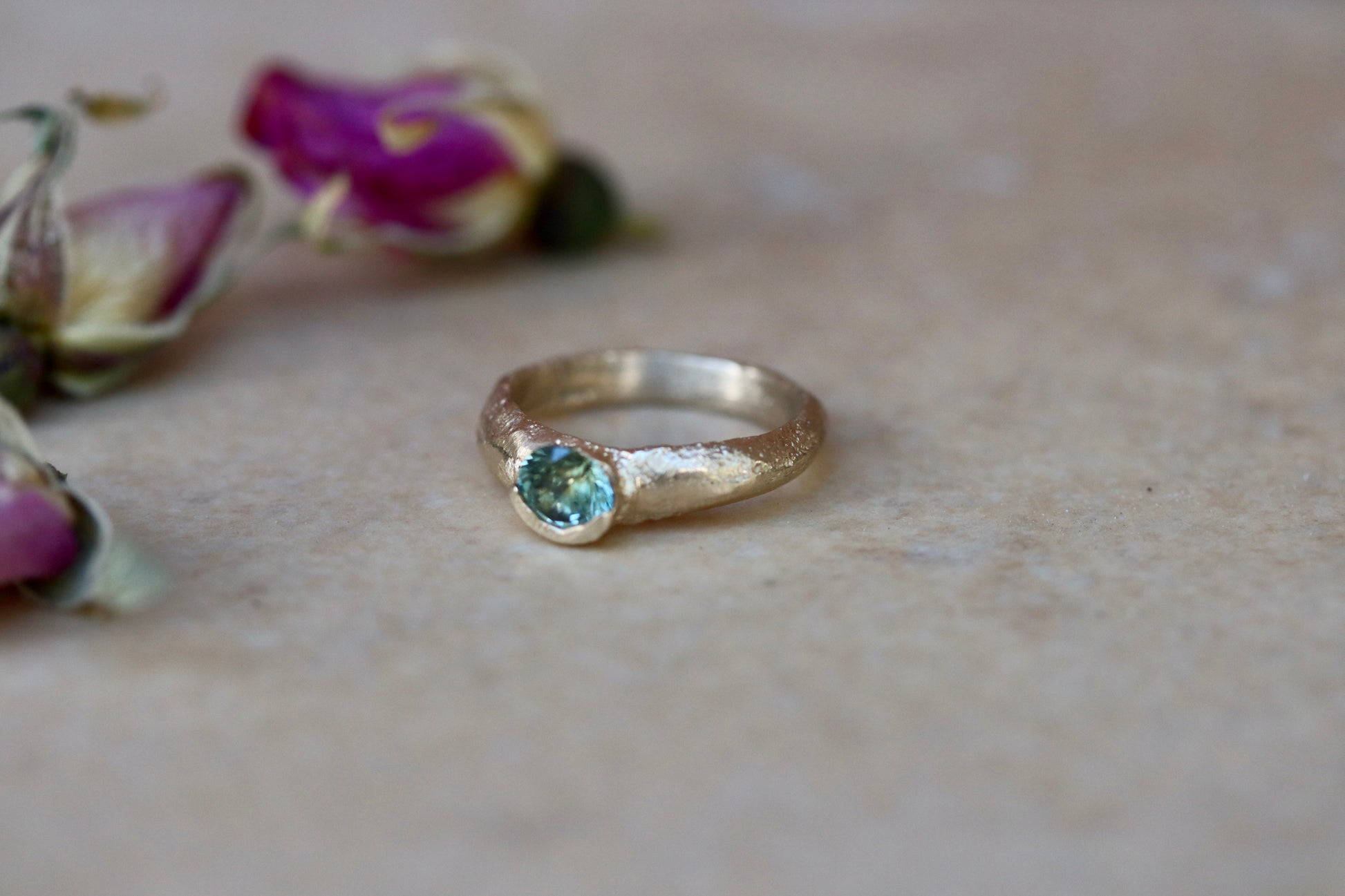 rustic organic ethical montana sapphire green sandcast solitaire engagement ring paige devlin jewelry the arrowleaf whimsical earthy ethereal engagement ring