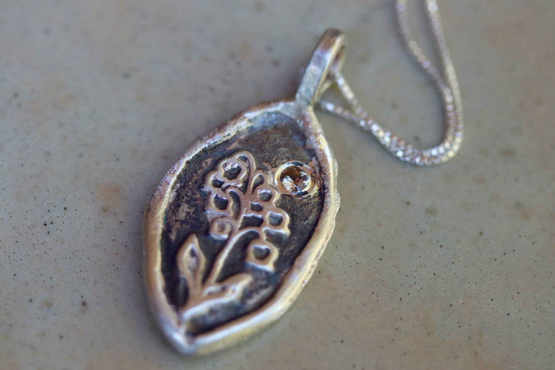 heather mountain pendant sterling silver handmade handcrafted montana sapphire pink floral alpine wildflower necklace paige devlin jewelry