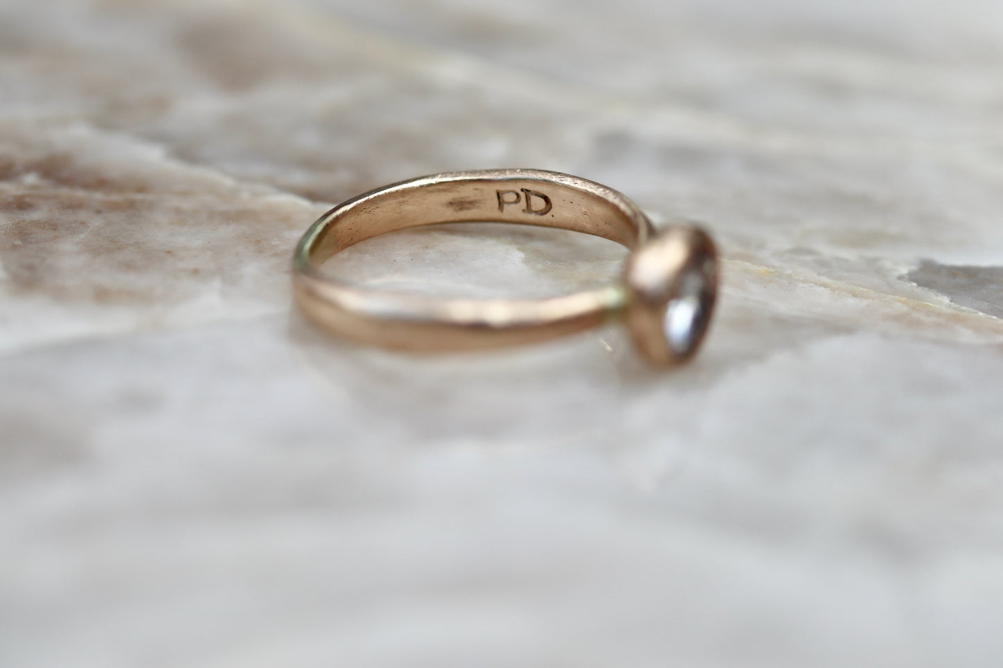 solitaire 1ct ethical diamond earthy organic texture sandcast wedding engagement ring paige devlin methow valley washington wedding jeweler alternative unique nature inspired ring 14kt recycled gold artisan handcrafted