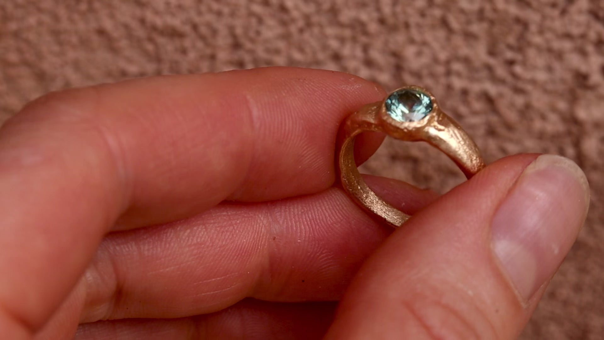 green montana sapphire solitaire sandcast rustic organic textured gold ethical paige devlin jewelry