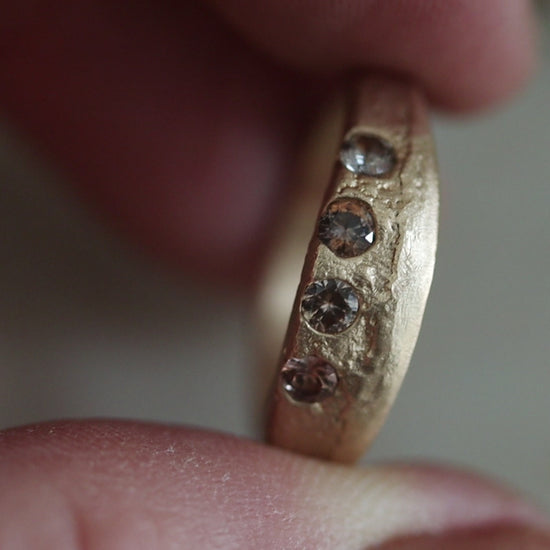 earth colored brown peach lavender montana sapphire organic sandcast wedding band paige devlin jewelry