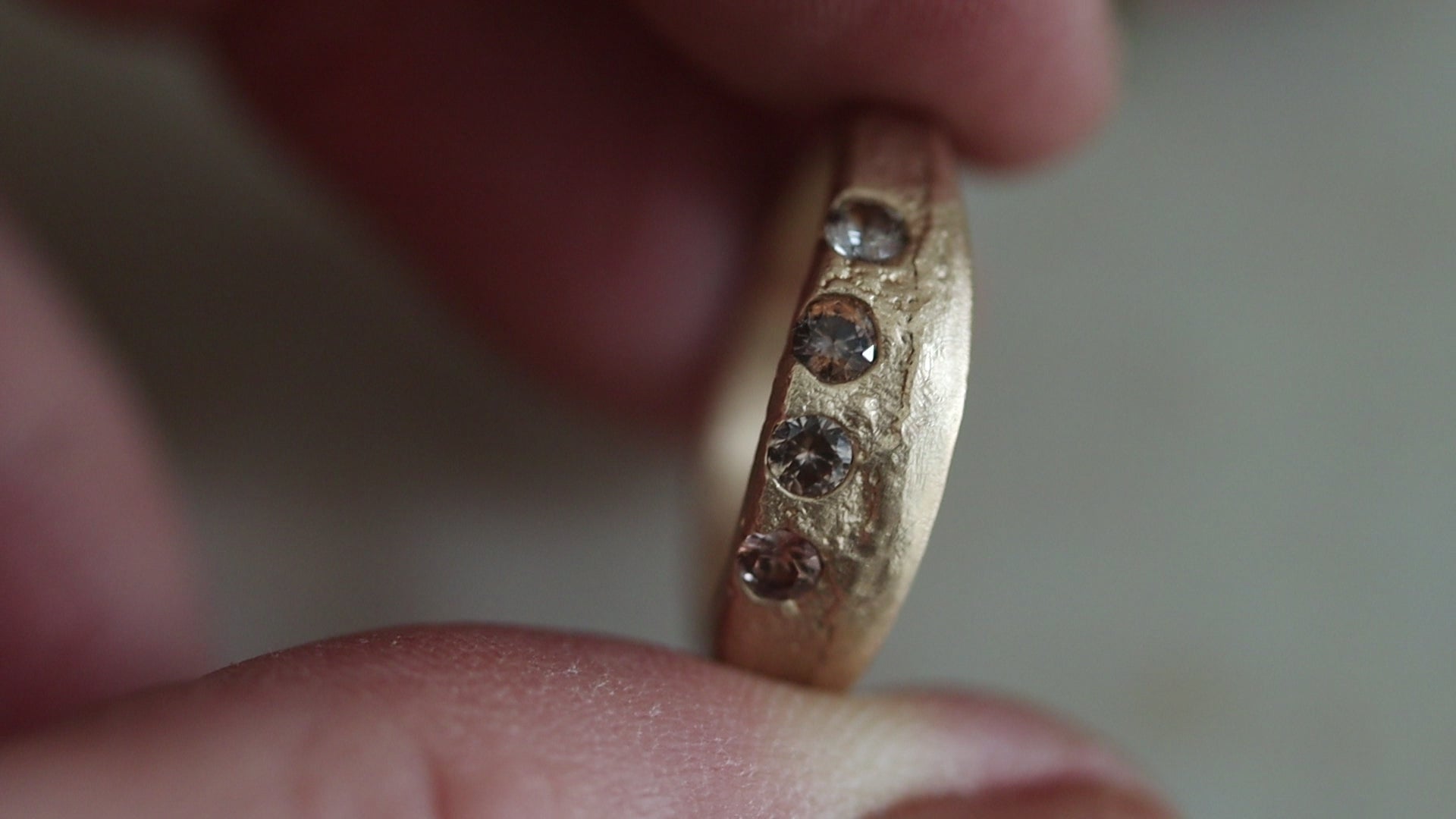 earth colored brown peach lavender montana sapphire organic sandcast wedding band paige devlin jewelry