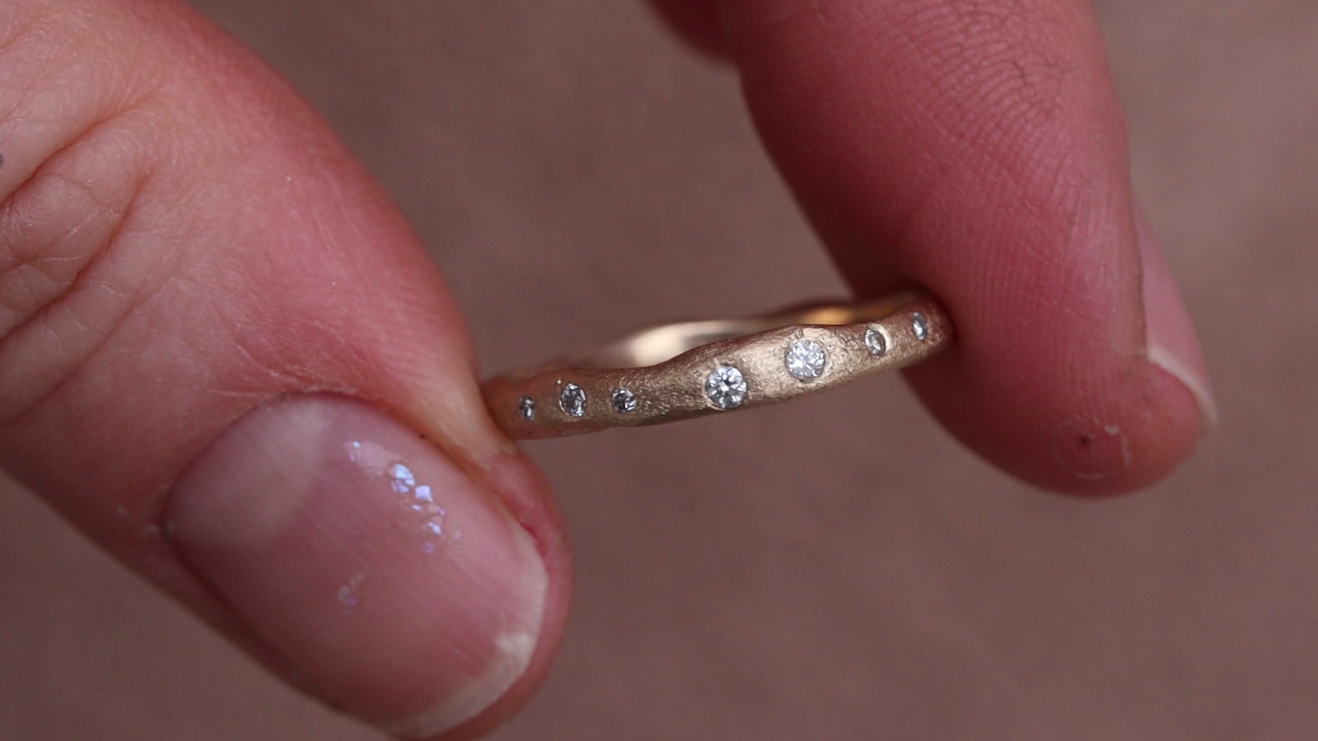 rustic organic gold 14kt sandcast ethical reclaimed scattered diamonds paige devlin jewelry wedding band ring wabi sabi rustic