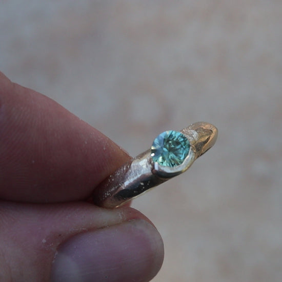 montana sapphire solitaire engagement ring sandcast organic rustic paige devlin jewelry