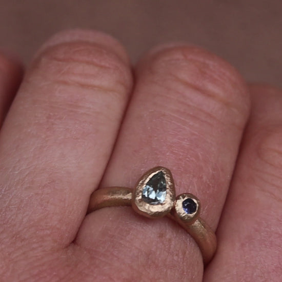blue montana sapphire organic texture sandcast paige devlin jewelry 14kt gold handcrafted engagement ring pear shape yogo sapphire
