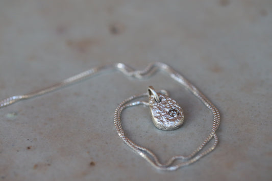 recycled diamond ethical organic texture necklace sandcast paige devlin jewelry methow valley jewelry artistorganic texture reclaimed diamond ethical rustic organic sandcast petite small ethical recycled silver necklace paige devlin jewelry
