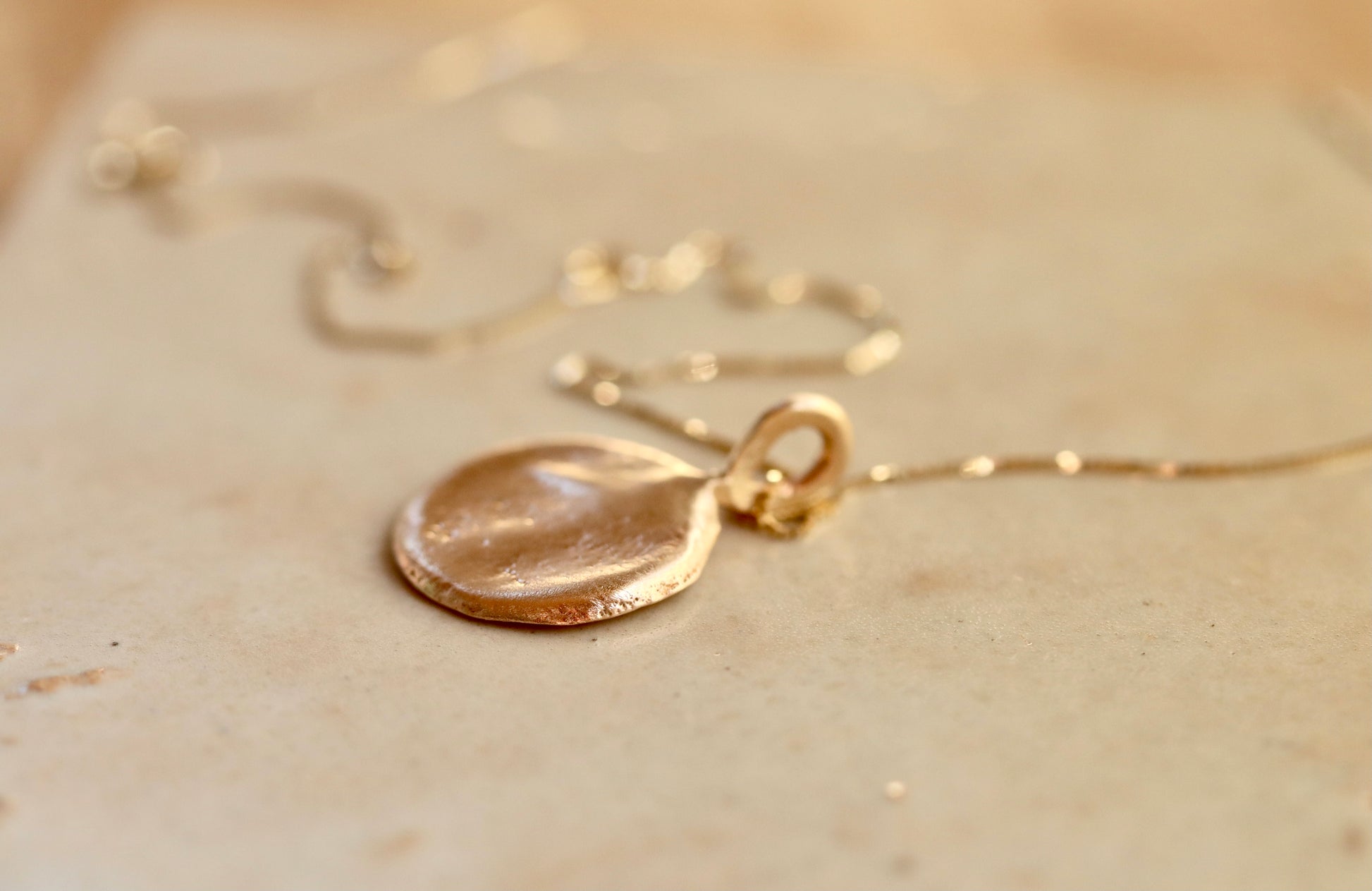 recycled gold moon orb sandcast organic necklace natural fine jewelry ethical jewelry paige devlin jewelry goddess necklace witch necklace selene 
