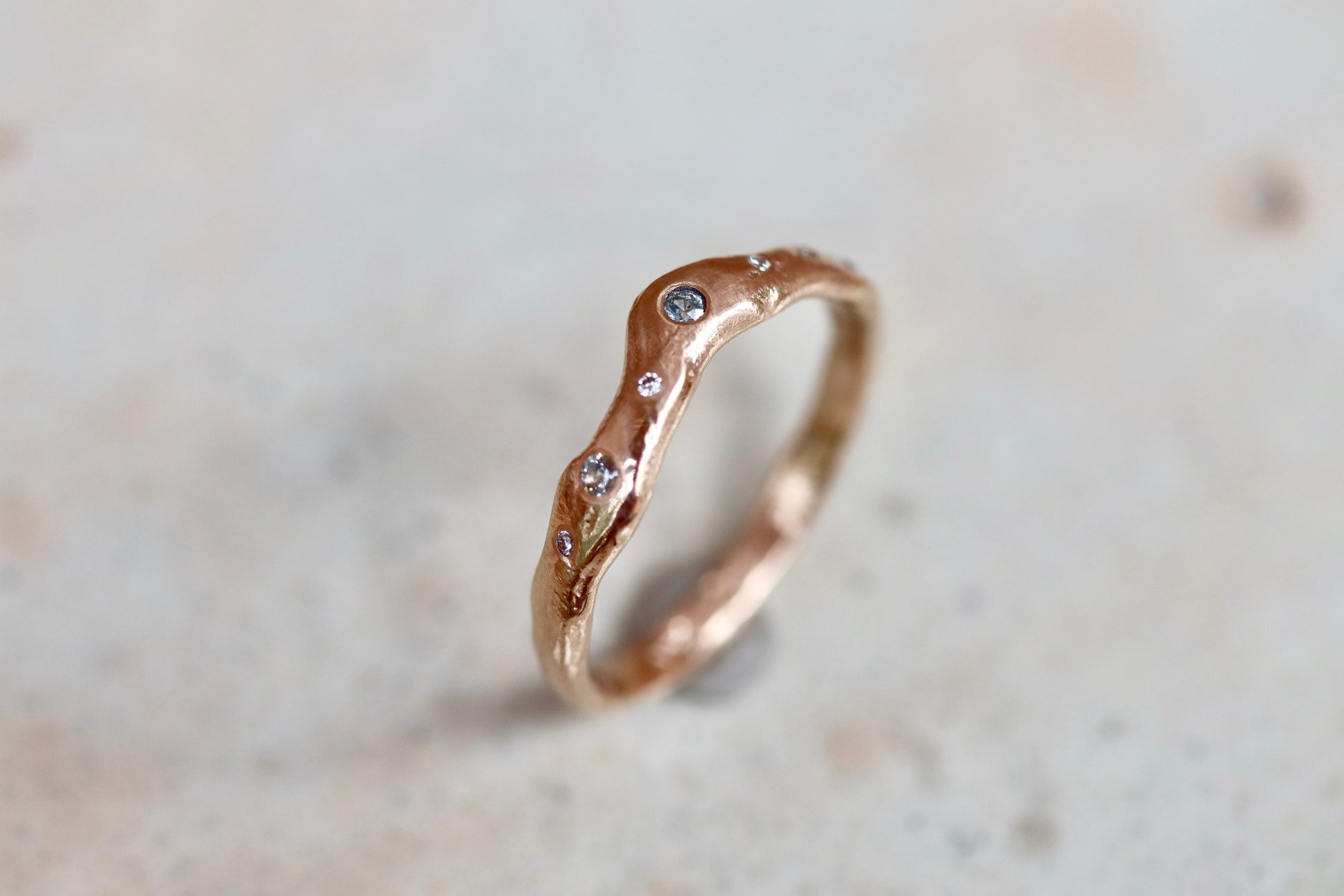 ethical montana sapphire diamond 14kt yellow recycled gold organic texture wavy scattered diamond wedding band nature inspired whimsical paige devlin jewelry