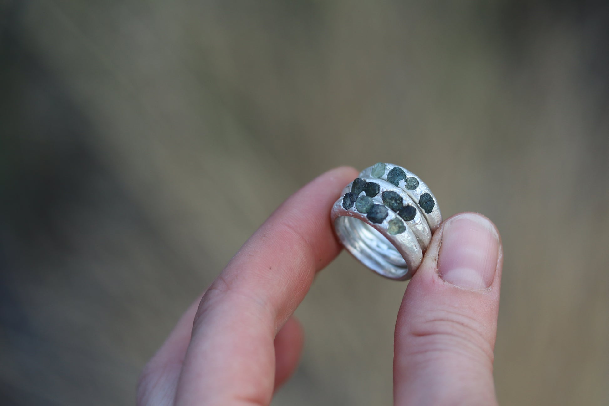 raw montana sapphire bandthe arrowleaf rustic organic earthen sandcast ring raw montana sapphire band silver sapphire band paige devlin jewelry