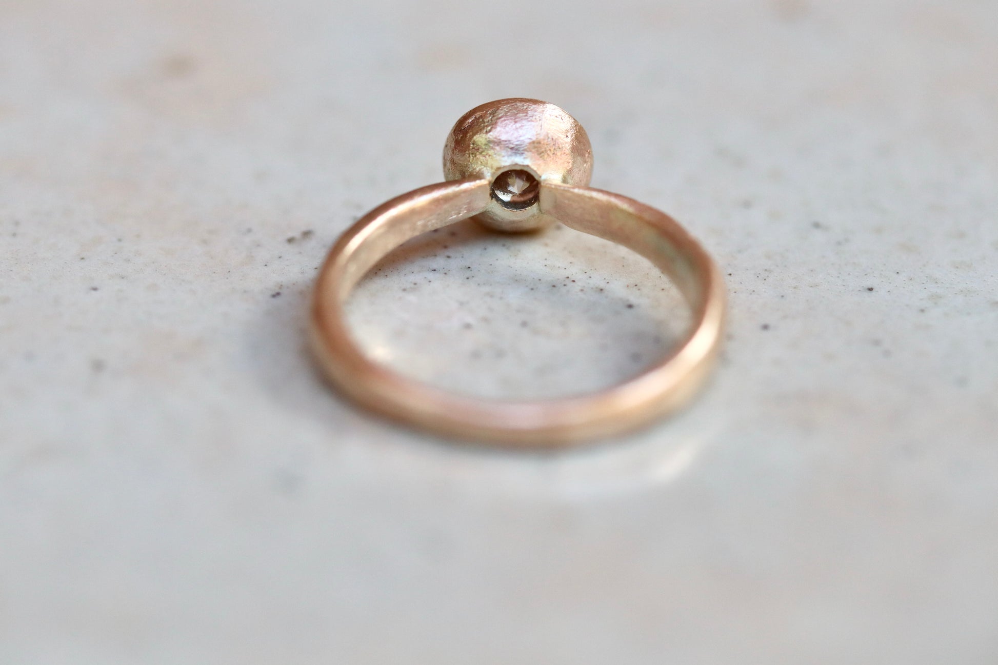 solitaire 1ct ethical diamond earthy organic texture sandcast wedding engagement ring paige devlin methow valley washington wedding jeweler alternative unique nature inspired ring 14kt recycled gold artisan handcrafted