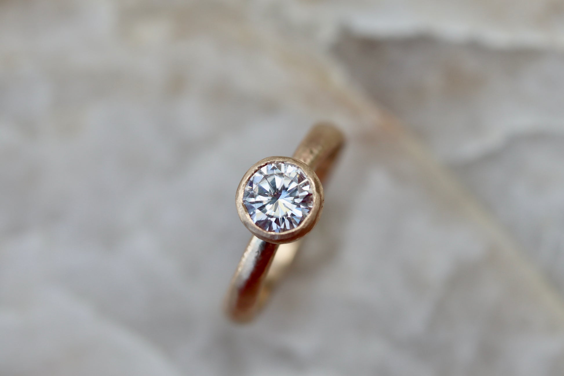 solitaire 1ct ethical diamond earthy organic texture sandcast wedding engagement ring paige devlin methow valley washington wedding jeweler alternative unique nature inspired ring 14kt recycled gold artisan handcrafted