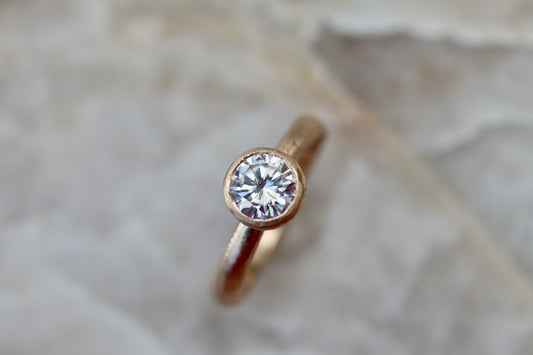 solitaire 1ct ethical diamond earthy organic texture sandcast wedding engagement ring paige devlin methow valley washington wedding jeweler alternative unique nature inspired ring 14kt recycled gold artisan handcrafted