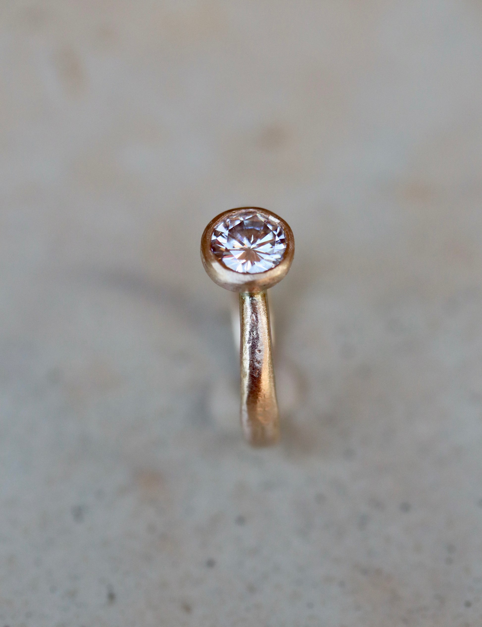 solitaire 1ct ethical diamond earthy organic texture sandcast wedding engagement ring paige devlin methow valley washington wedding jeweler alternative unique nature inspired ring 14kt recycled gold artisan handcrafted